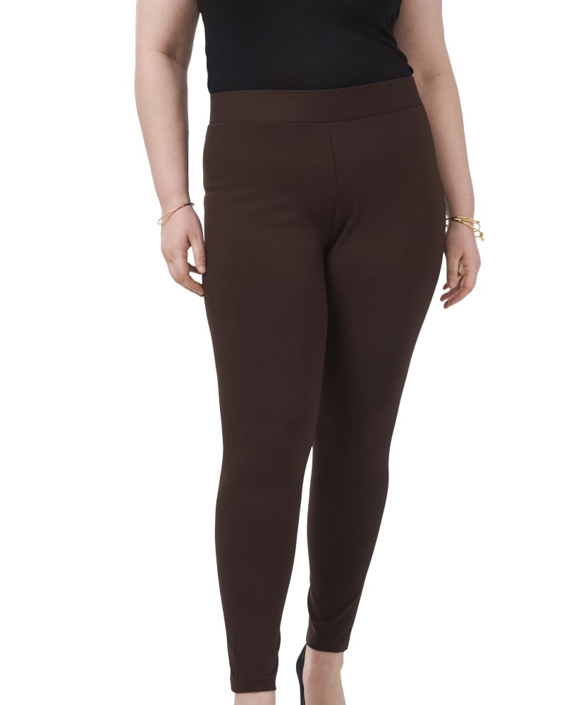 Front of a model wearing a size 1X PONTE LEGGING in DARK EARTH by Vince Camuto. | dia_product_style_image_id:261548